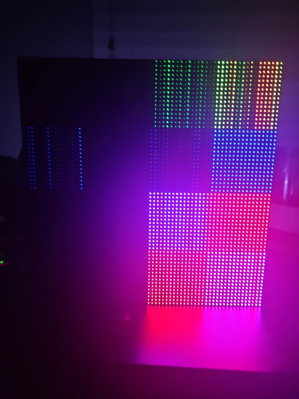 RGB LED matrix panels displaying multicolored light patterns
